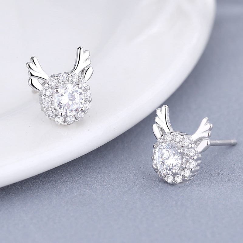 Women's earrings with sparkling crystals and playfully designed wings Style and Serve