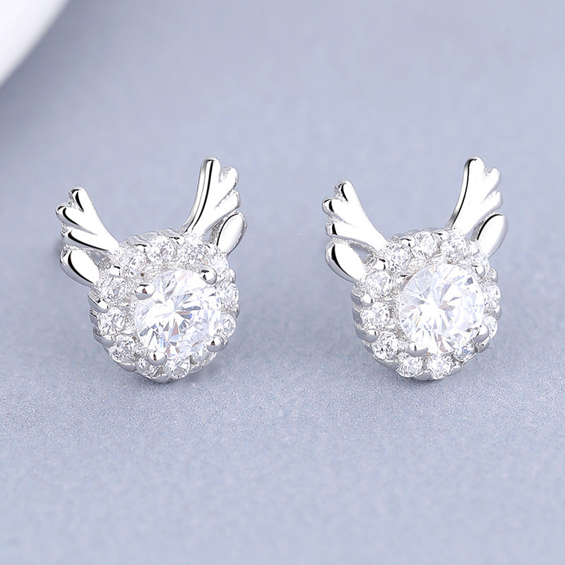 Women's earrings with sparkling crystals and playfully designed wings Style and Serve
