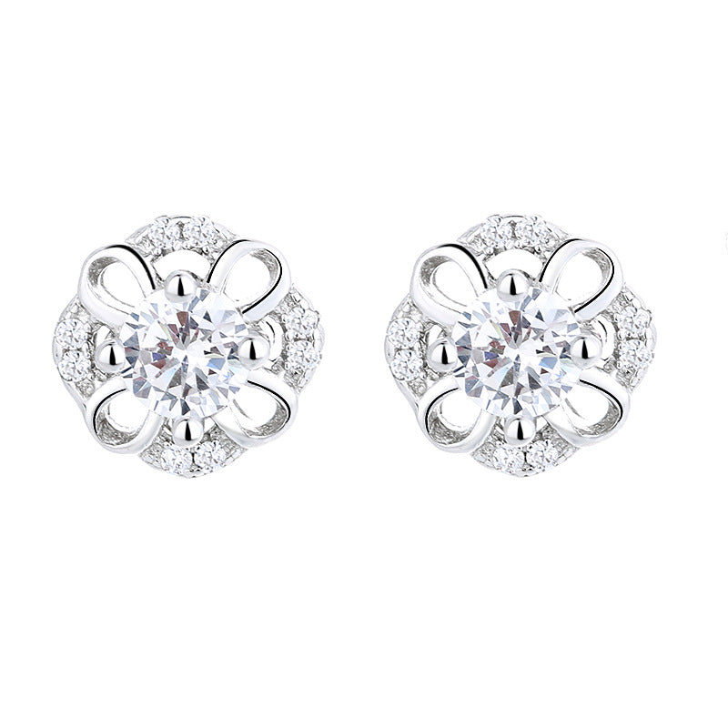 Women's stud earrings with delicate flower design and sparkling crystals Style and Serve