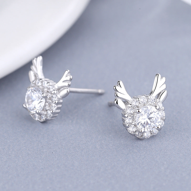Women's earrings with sparkling crystals and playfully designed wings Style and Serve