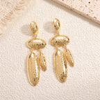 Women Hanging Earrings with artistic, three-dimensional design Style and Serve