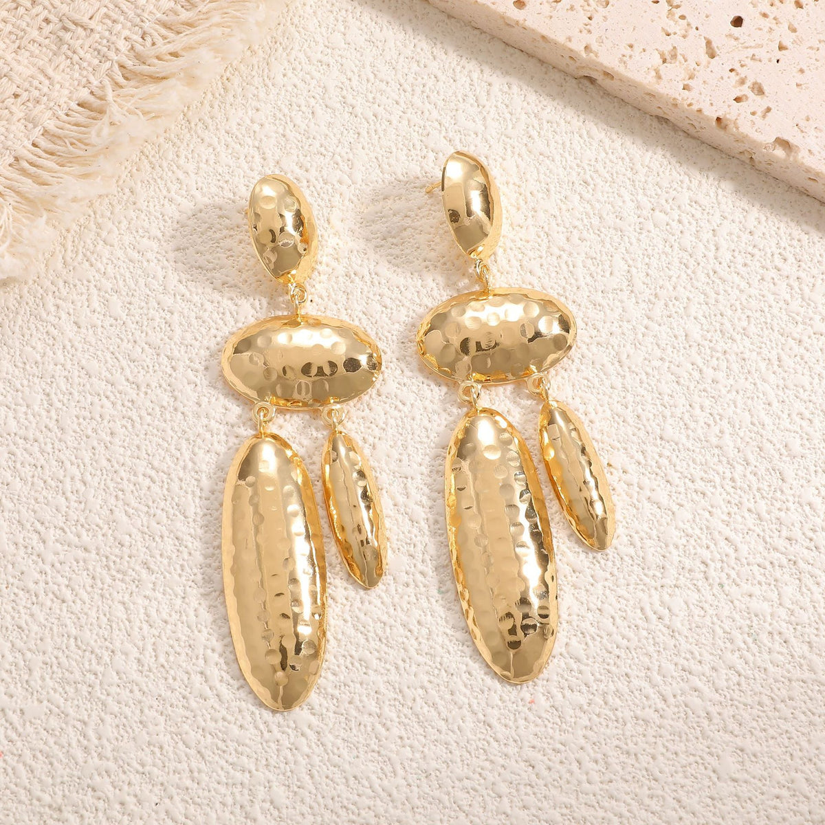 Women Hanging Earrings with artistic, three-dimensional design Style and Serve