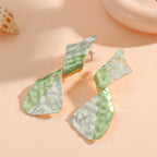 Ladies earrings in modern disc design Style and Serve