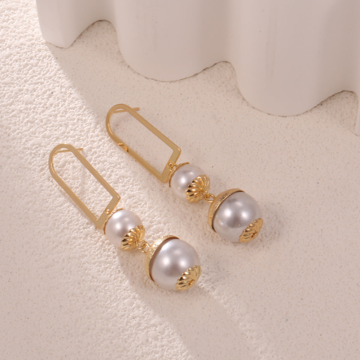 Ladies earrings with elegant pearl design Style and Serve