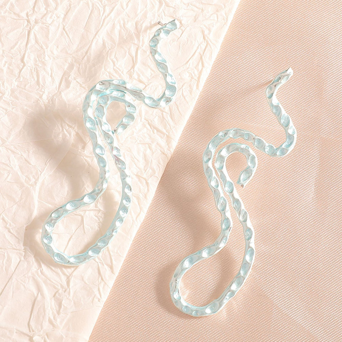 Ladies earrings in elegant wave pattern Style and Serve
