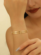 Ladies' bangle with elegant curved design Style and Serve
