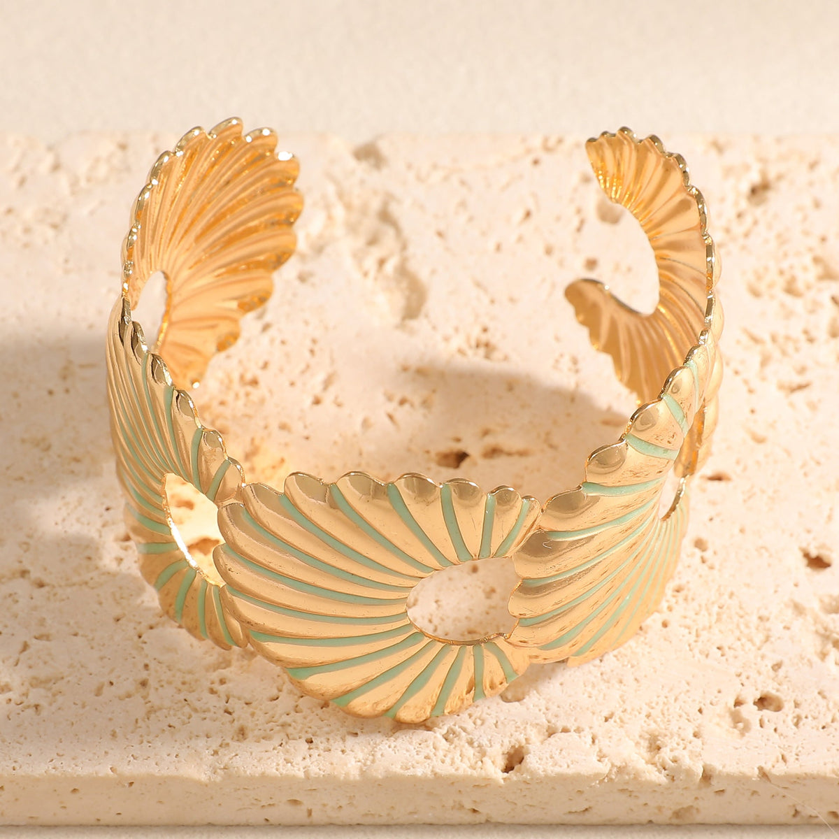 Women's bangle with elegant shell design Style and Serve