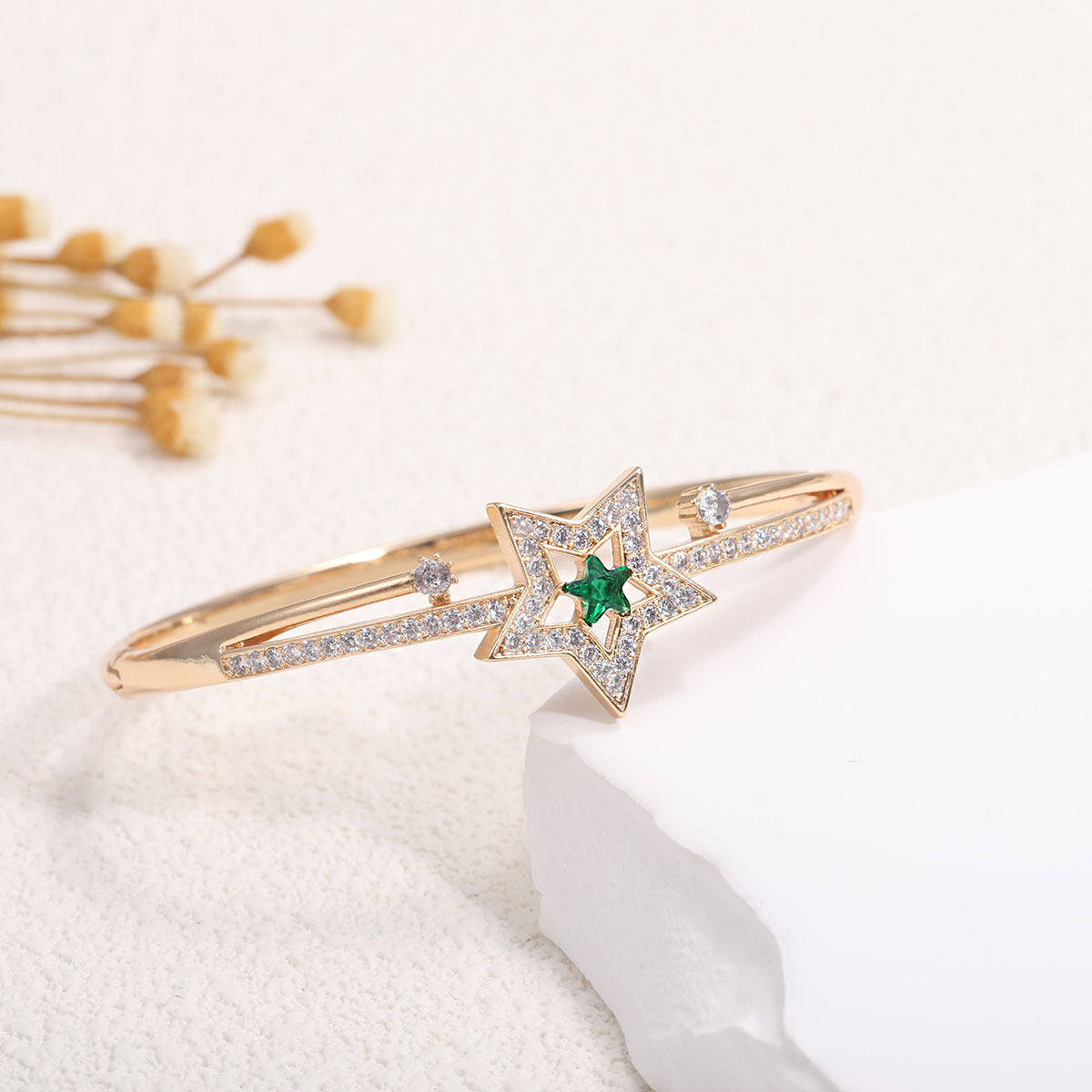 Women's bangle with elegant infinity pattern and sparkling zirconia Style and Serve