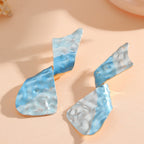 Ladies earrings in modern disc design Style and Serve