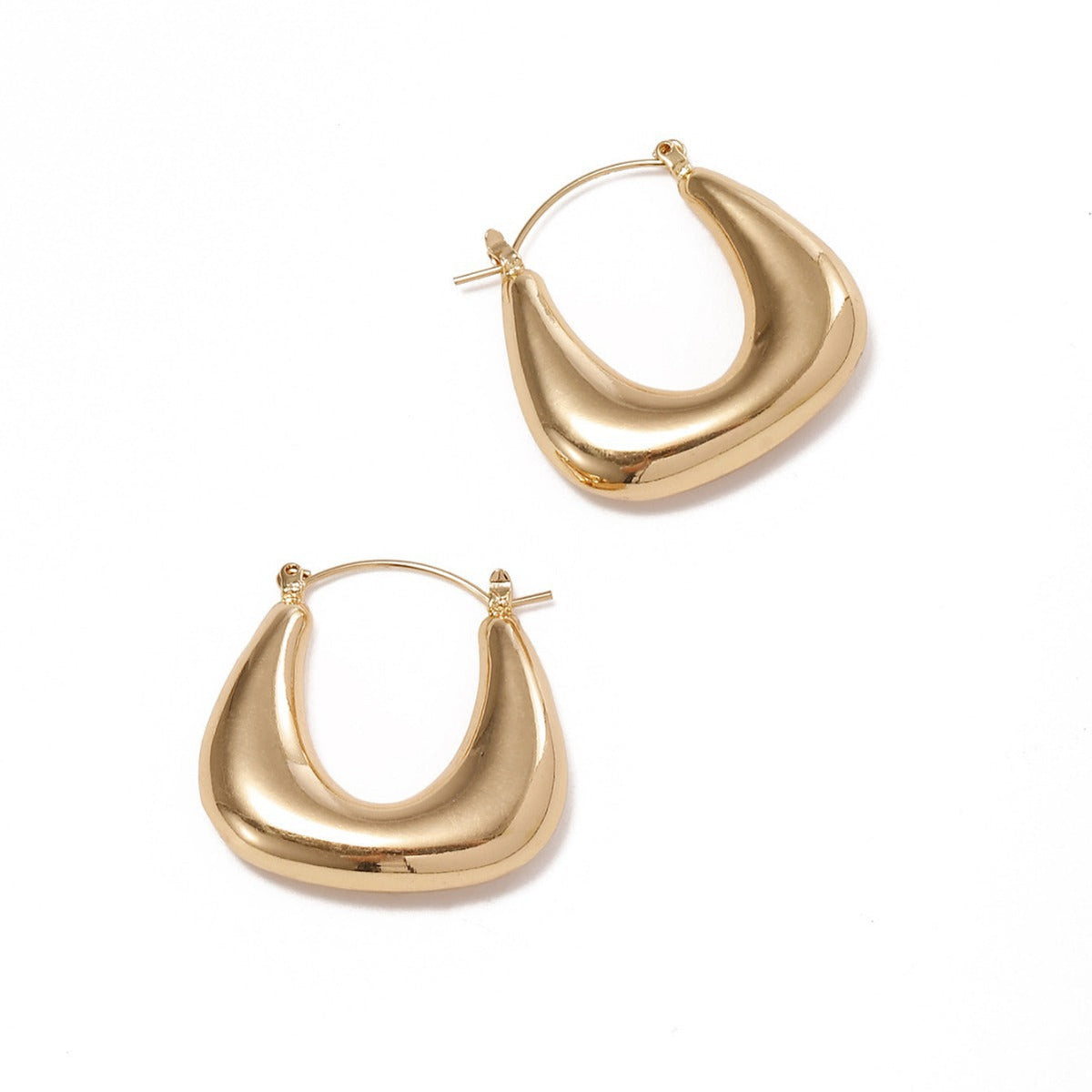 Ladies earrings in a modern, curved design Style and Serve