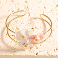 Women's bangle with elaborate floral design Style and Serve