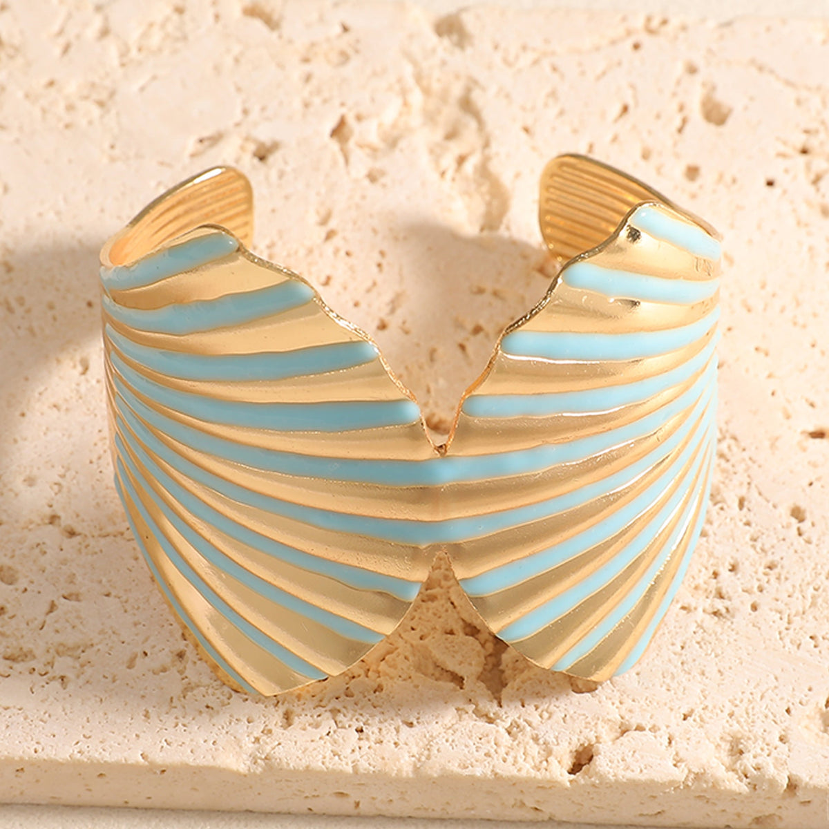 Women's bangle with elegant shell design Style and Serve