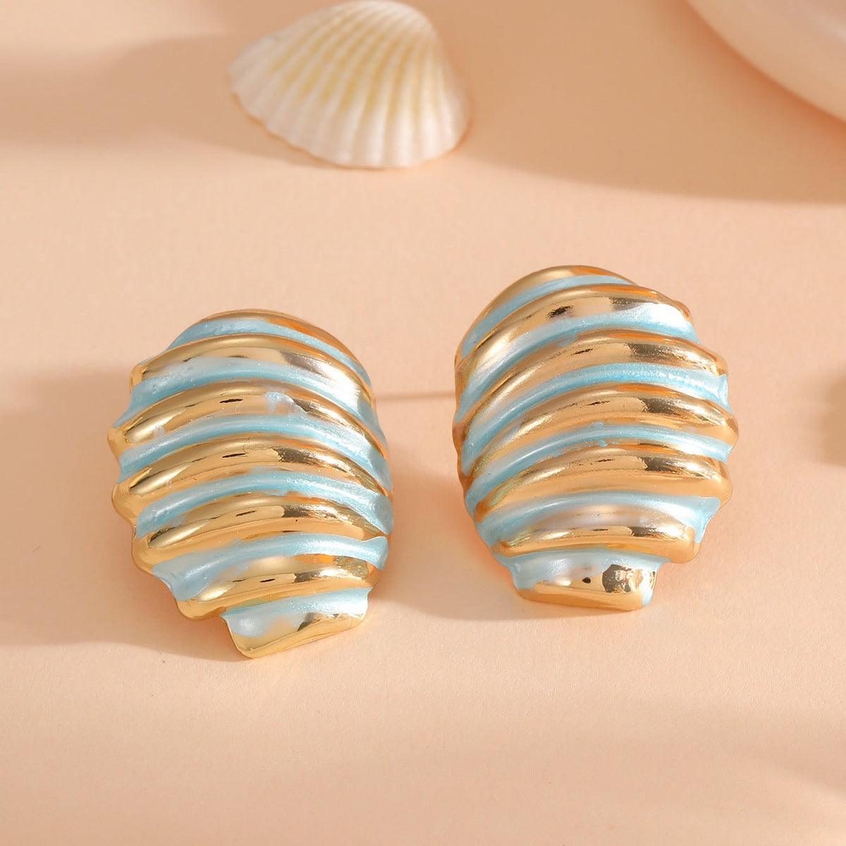 Women's ear clips in maritime shell design Style and Serve
