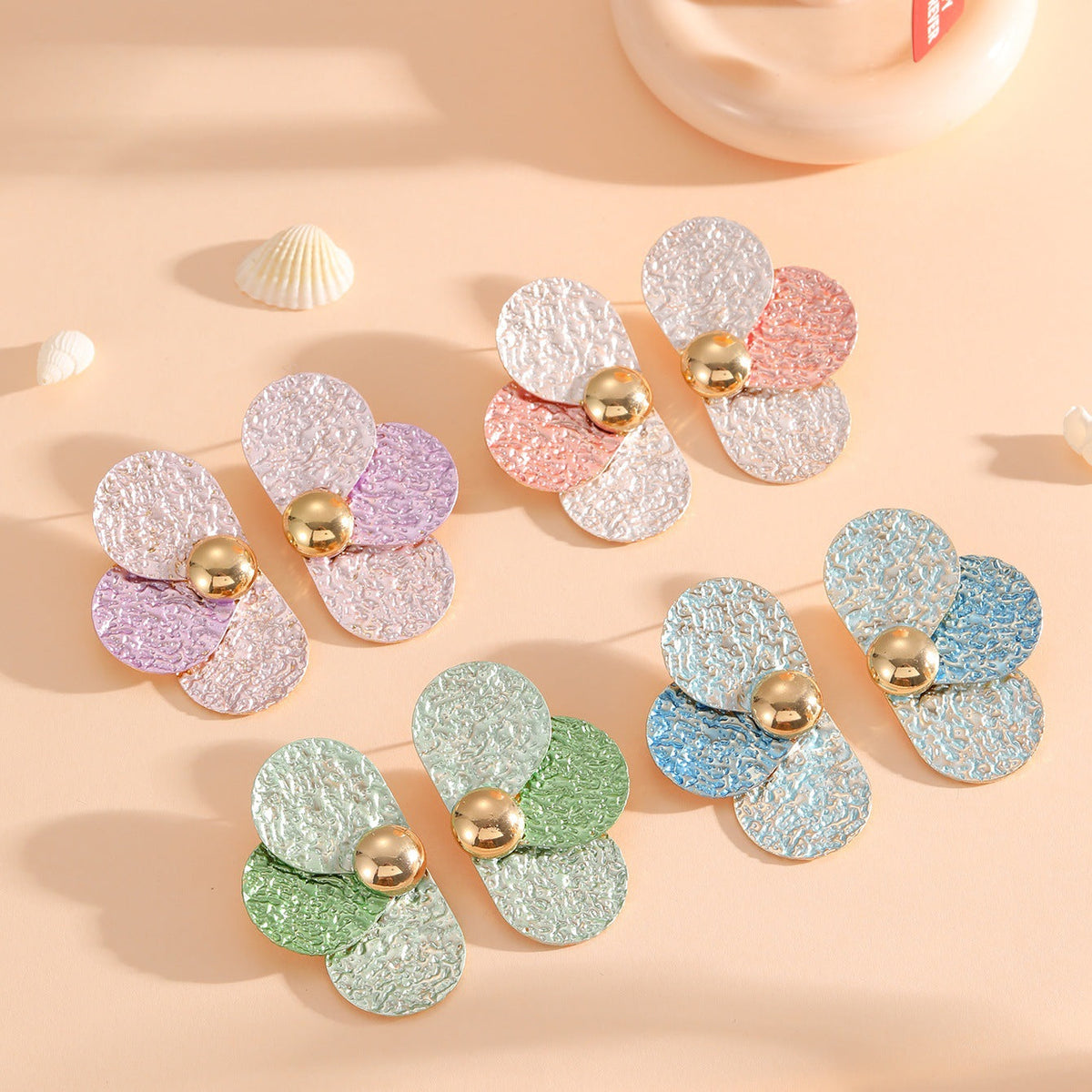 Women's ear clips in elaborate floral pattern Style and Serve