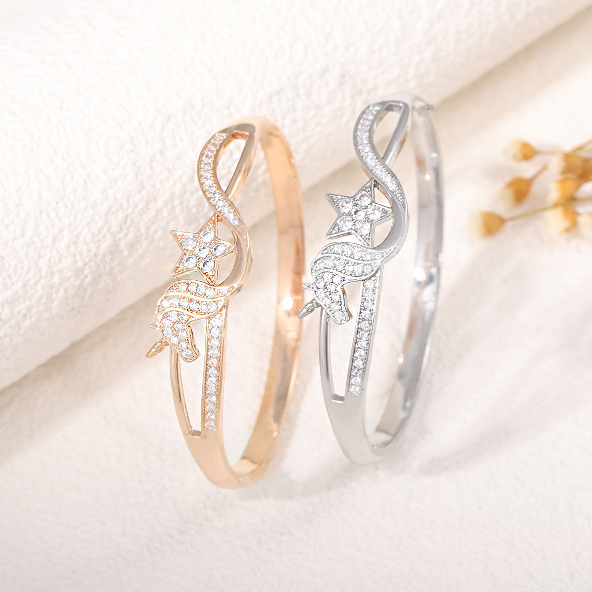 Women's bangle with elegant infinity pattern and sparkling zirconia Style and Serve