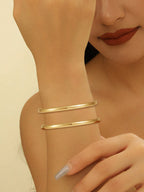 Ladies' bangle with elegant curved design Style and Serve