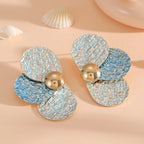 Women's ear clips in elaborate floral pattern Style and Serve