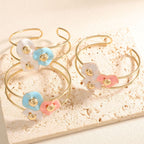 Women's bangle with elaborate floral design Style and Serve