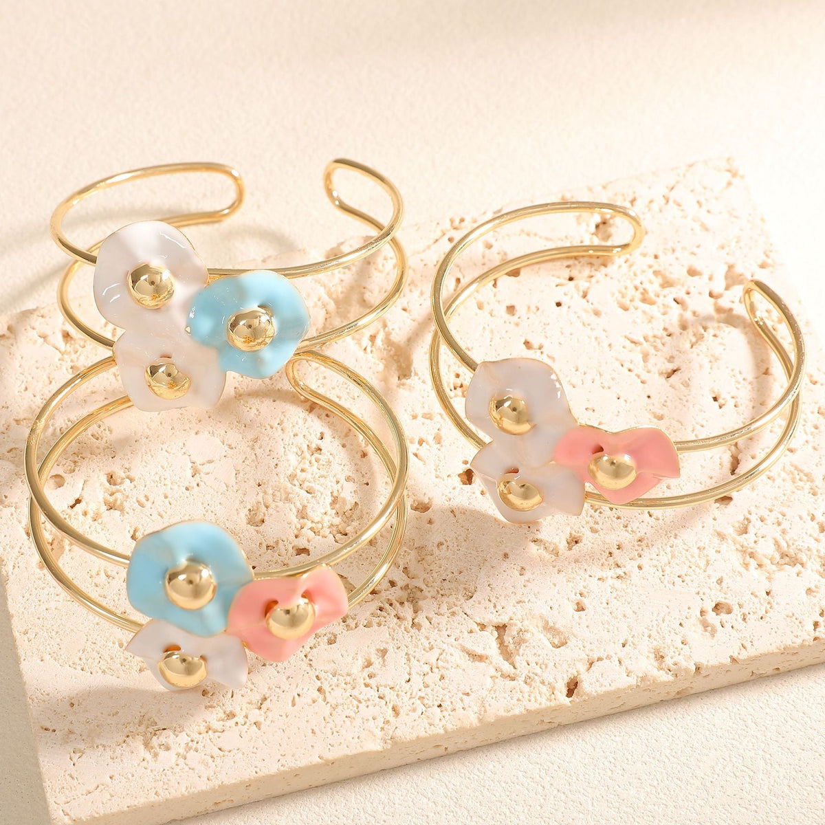 Women's bangle with elaborate floral design Style and Serve
