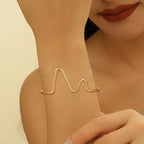 Women's cuff in modern wave pattern Style and Serve