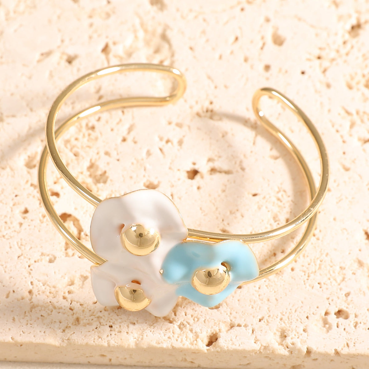 Women's bangle with elaborate floral design Style and Serve
