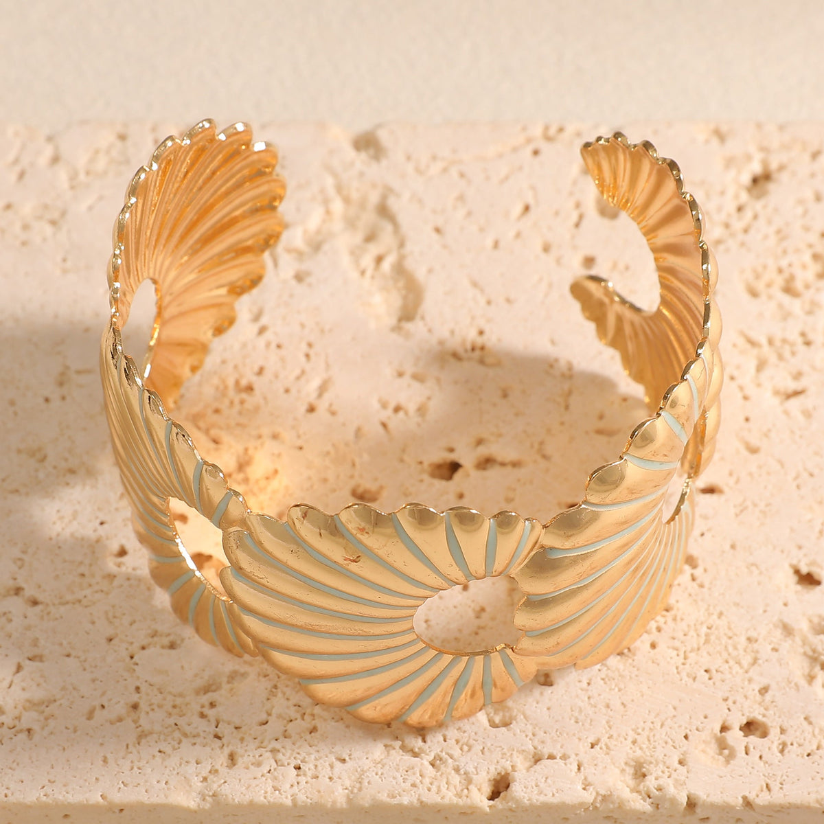 Women's bangle with elegant shell design Style and Serve