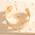 Women's cuff with elegant spiral design Style and Serve
