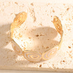 Women's cuff with elegant spiral design Style and Serve