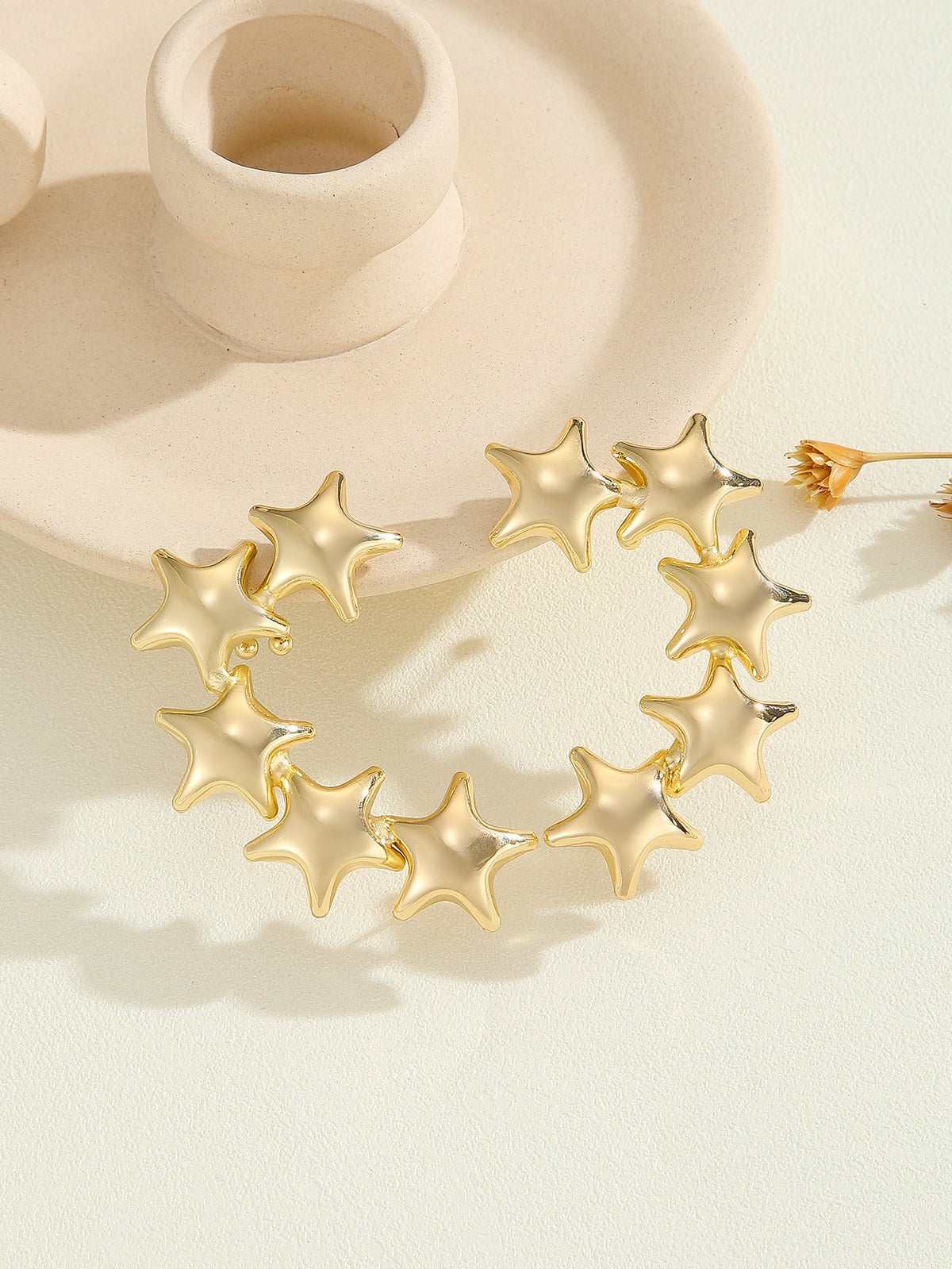 Women's bracelet with structured, golden beads Style and Serve