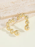 Women's bracelet with structured, golden beads Style and Serve