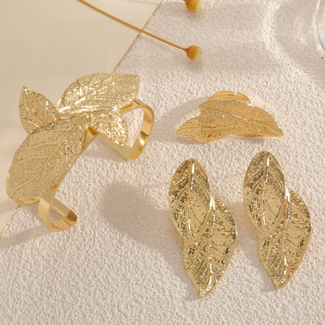 Ladies' bangle with artistic leaf design Style and Serve