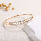 Women's bangle with elegant infinity pattern and sparkling zirconia Style and Serve