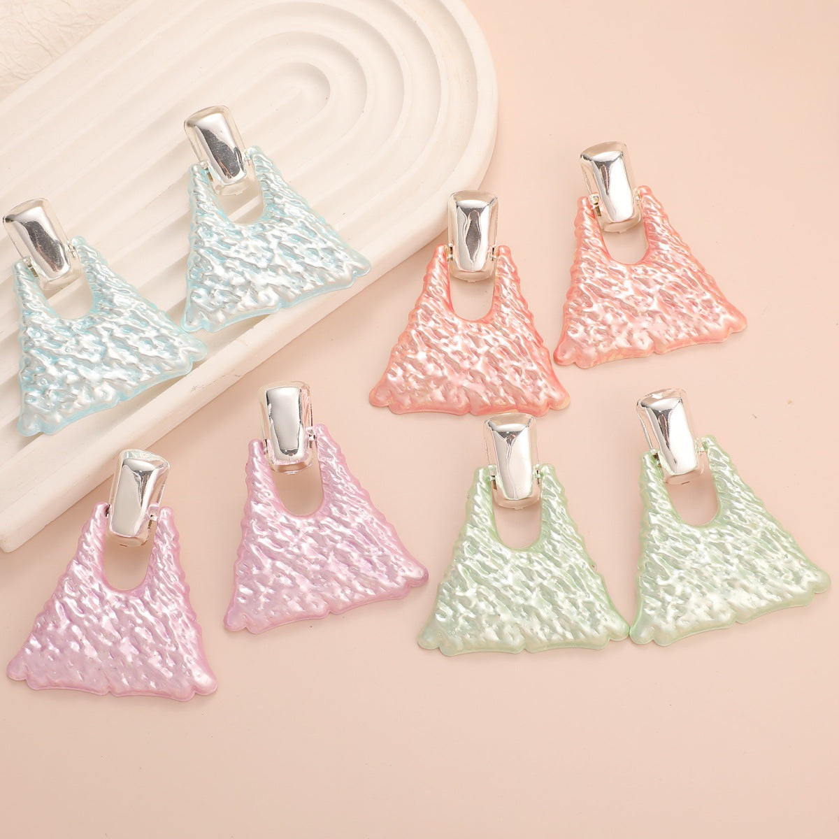Women's earrings in artistic design Style and Serve