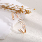 Women's bangle with elegant infinity pattern and sparkling zirconia Style and Serve
