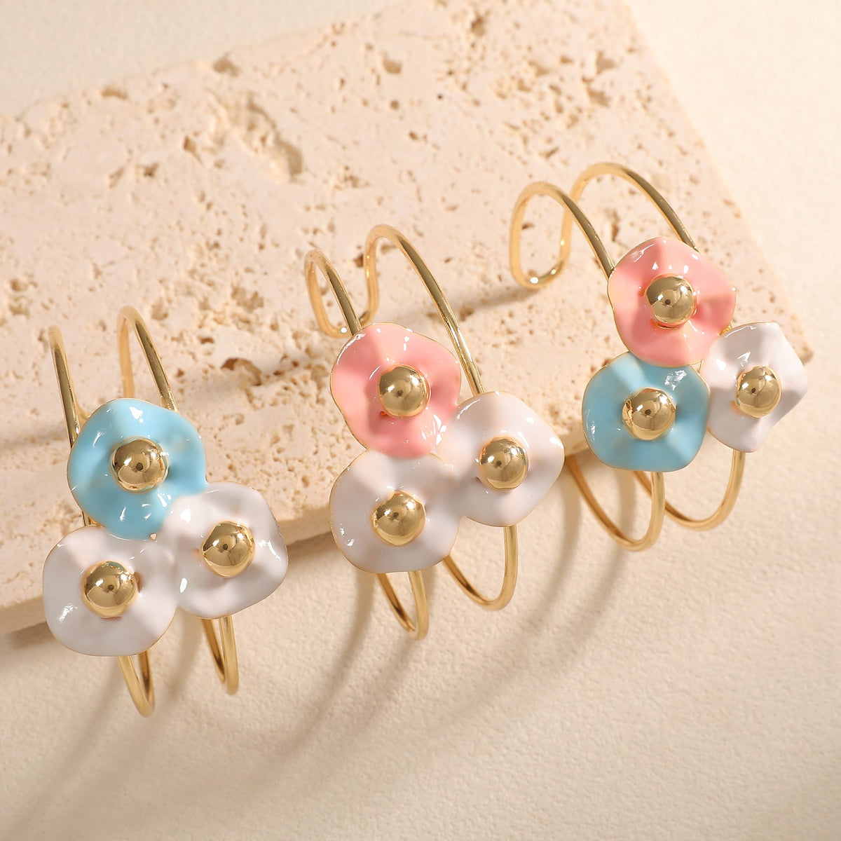 Women's bangle with elaborate floral design Style and Serve