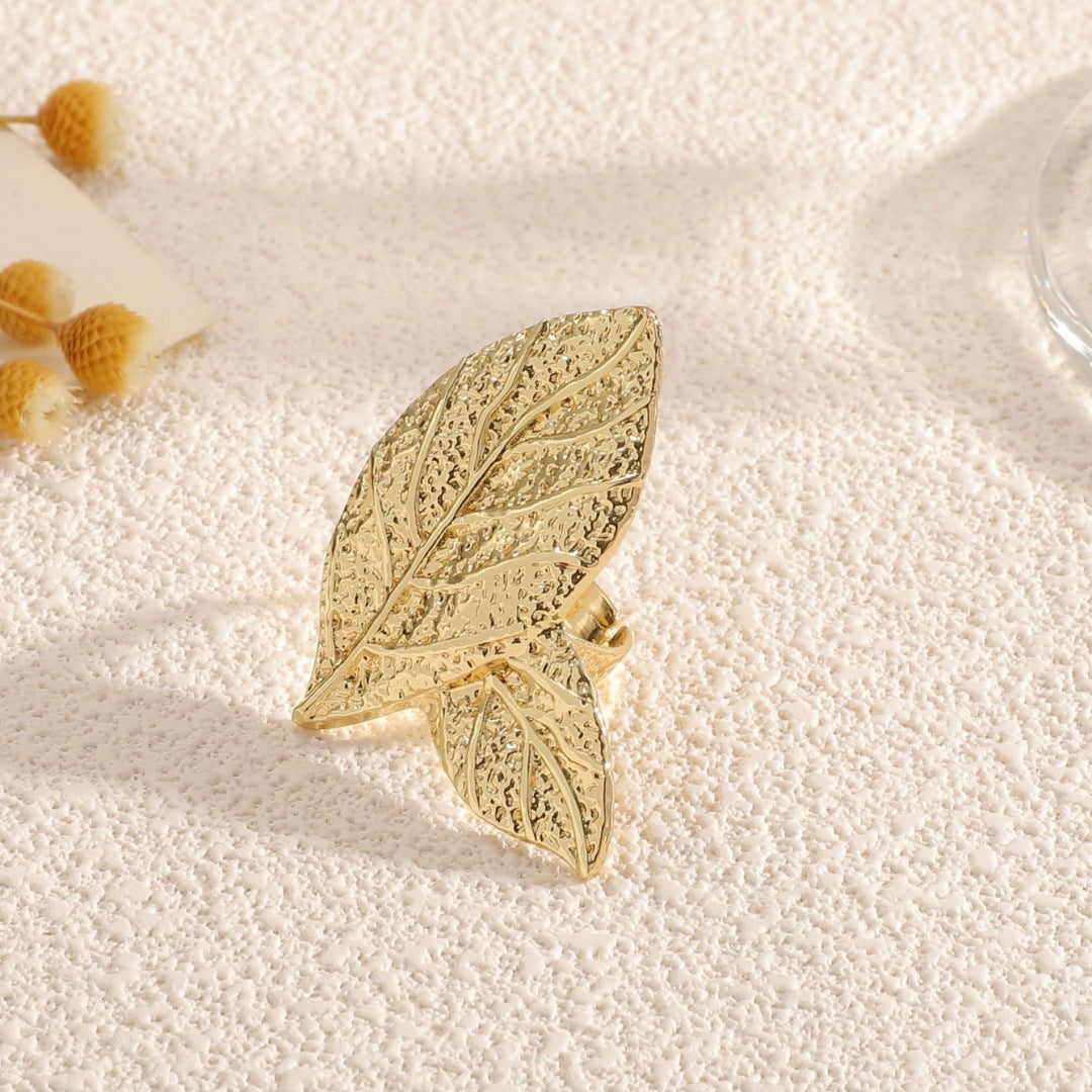Ladies' bangle with artistic leaf design Style and Serve