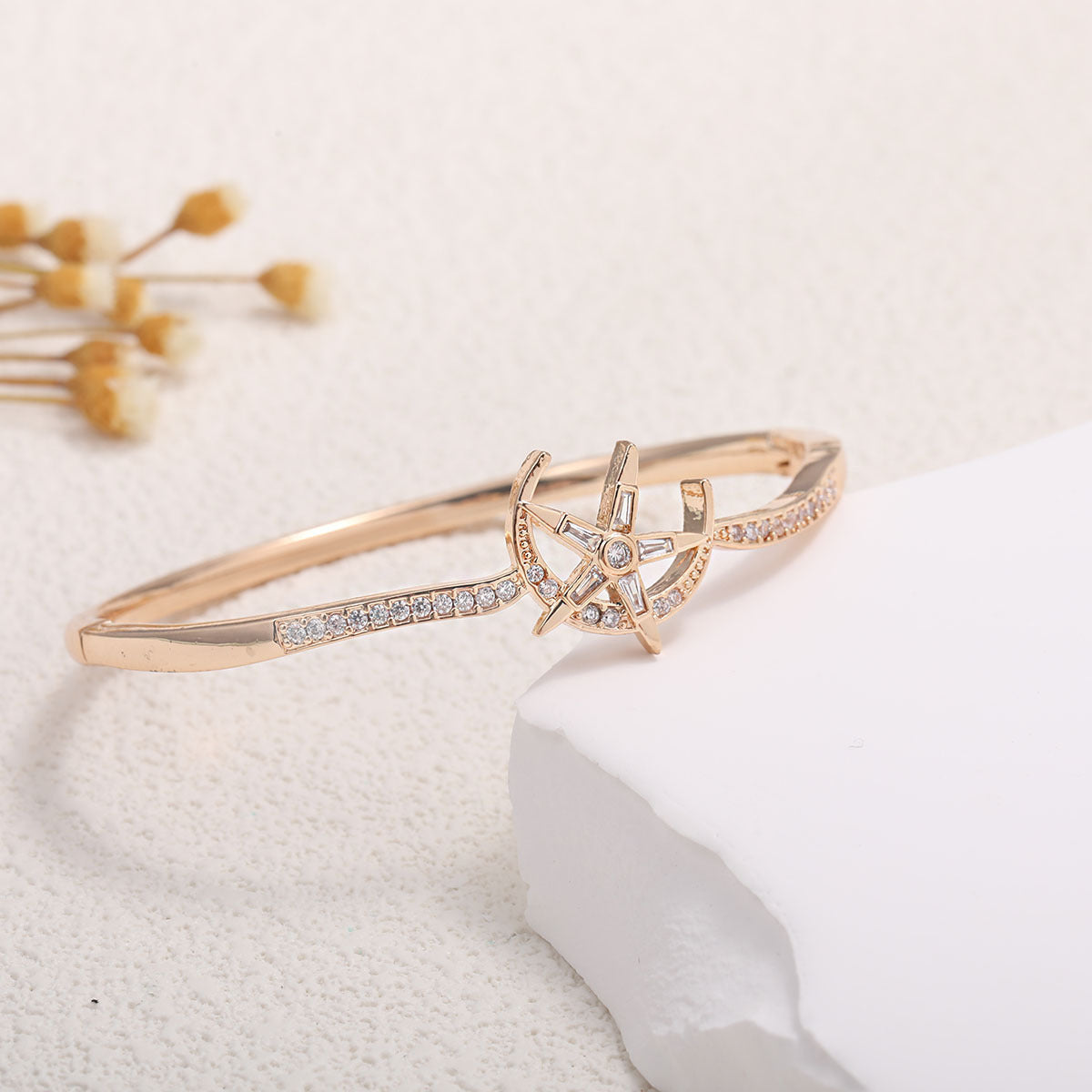 Women's bangle with elegant infinity pattern and sparkling zirconia Style and Serve
