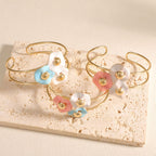 Women's bangle with elaborate floral design Style and Serve