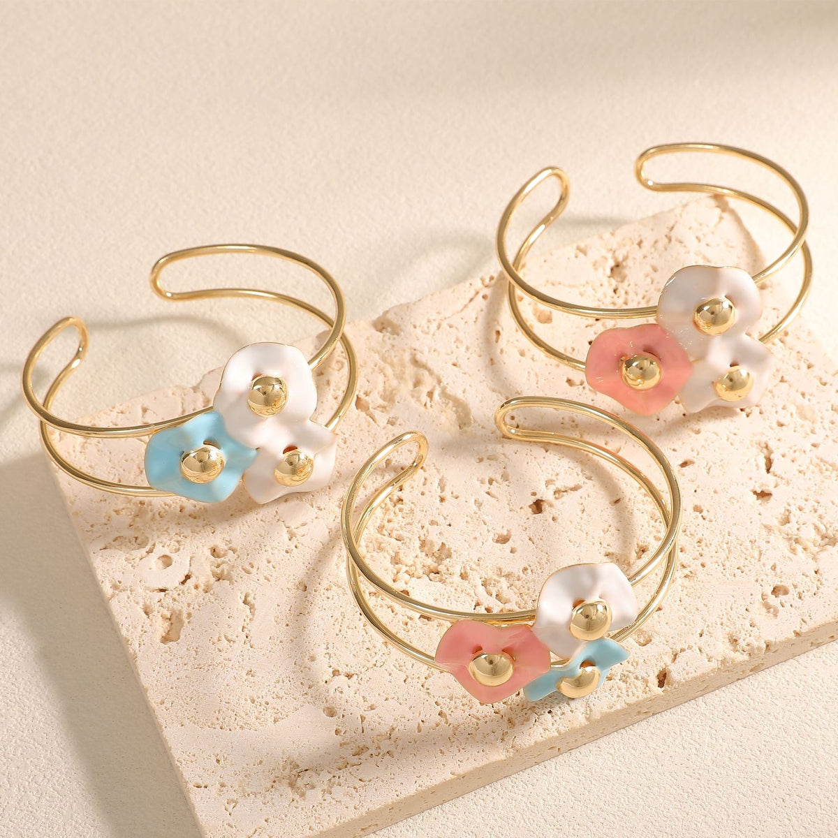 Women's bangle with elaborate floral design Style and Serve