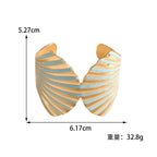 Women's bangle with elegant shell design Style and Serve