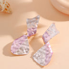 Ladies earrings in modern disc design Style and Serve