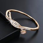 Women's bangle with elegant infinity pattern and sparkling zirconia Style and Serve