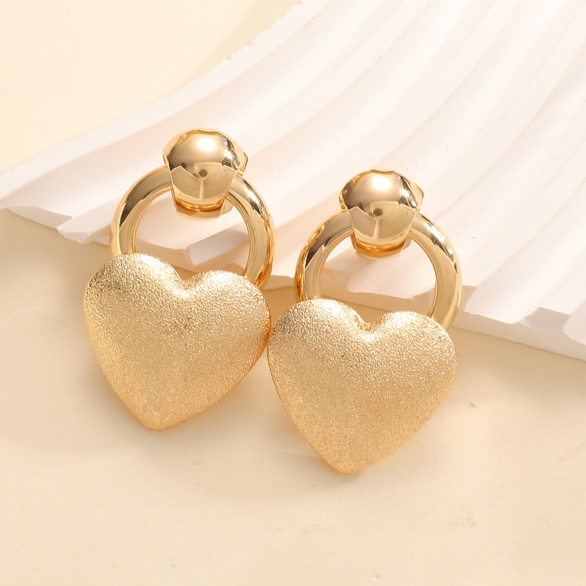 Ladies earrings in elegant heart design Style and Serve