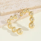 Women's bracelet with structured, golden beads Style and Serve