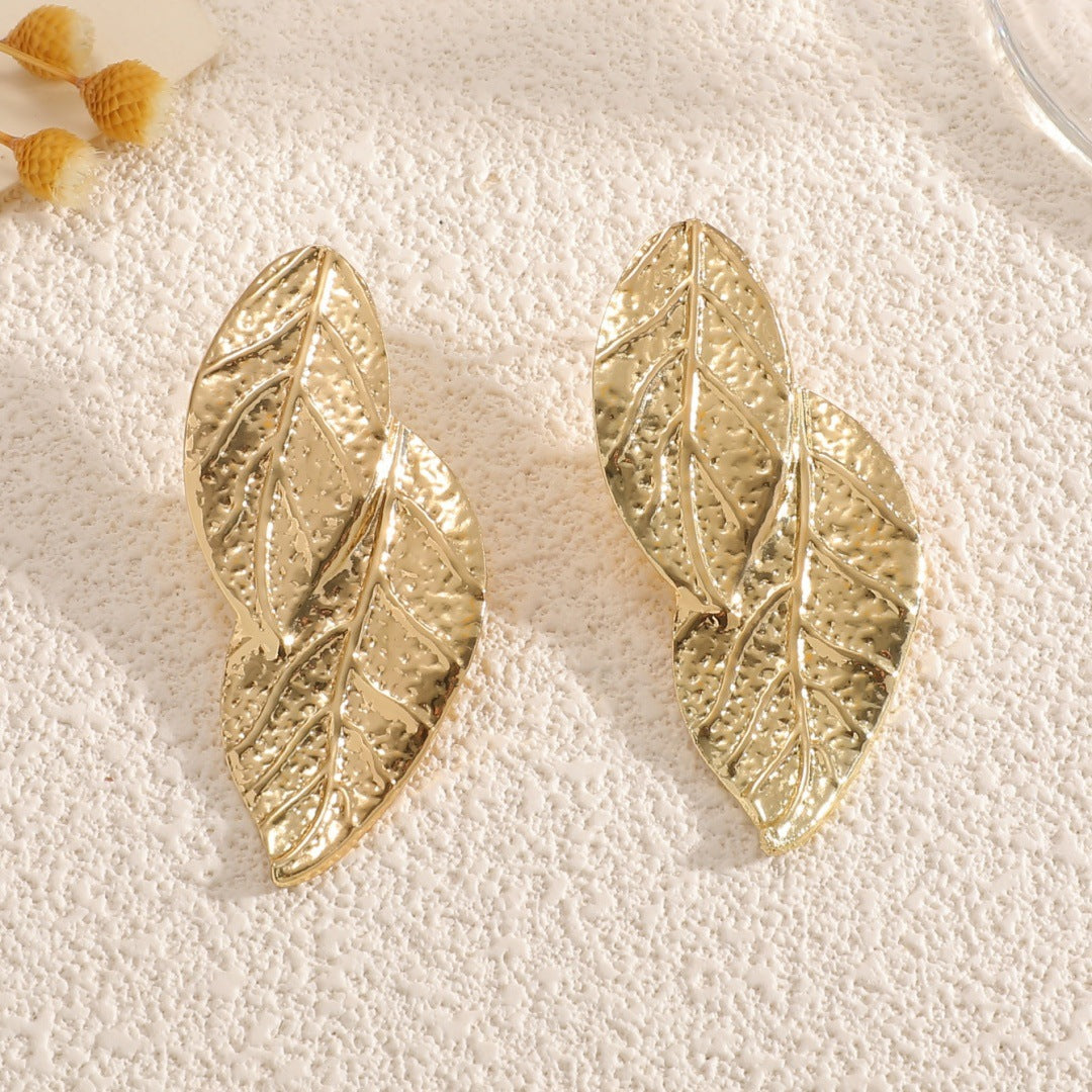 Ladies' bangle with artistic leaf design Style and Serve
