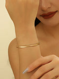 Ladies' bangle with elegant curved design Style and Serve