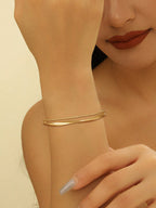 Ladies' bangle with elegant curved design Style and Serve
