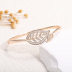 Women's bangle with elegant infinity pattern and sparkling zirconia Style and Serve