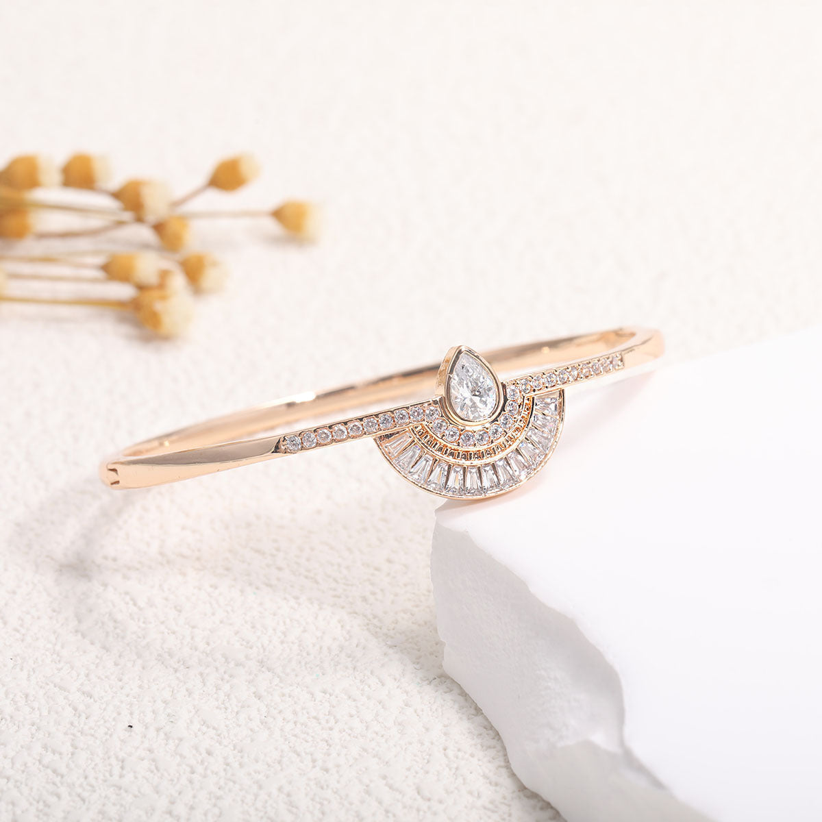 Women's bangle with elegant infinity pattern and sparkling zirconia Style and Serve