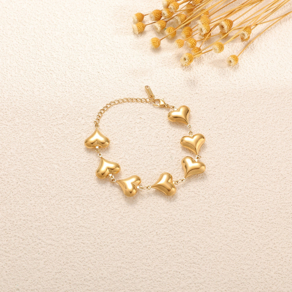 Ladies' bracelet with elegant heart design and fine link chain Style and Serve